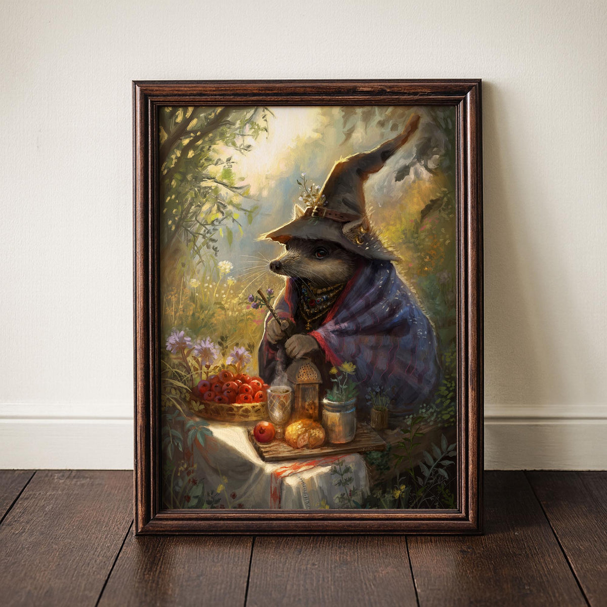 A framed art print depicting a whimsical woodland scene with a raccoon dressed as a wizard, leaning against a white wall on a dark wooden floor.