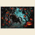 A rectangular art print or poster showing a dark black unicorn with a glowing orange horn in a spooky forest at night, surrounded by floating glowing jack-o'-lantern pumpkins and pale misty figures. The print is centered on a light beige background.